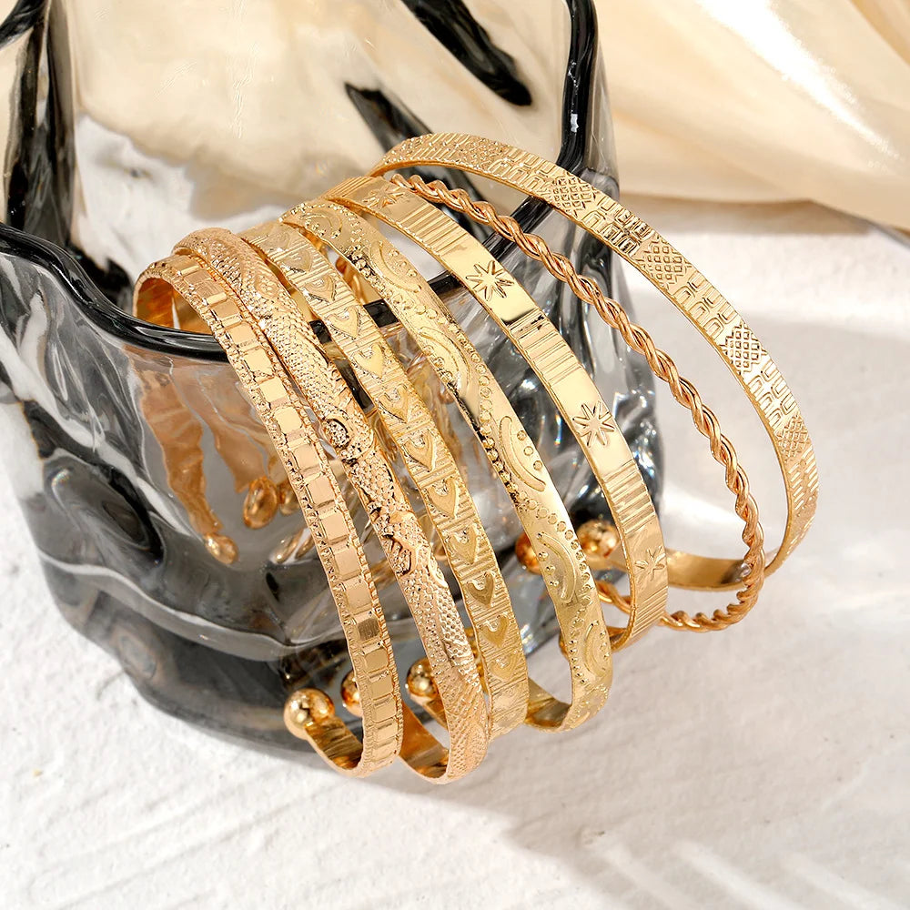 Set di 7 bracciali punk oro per donna